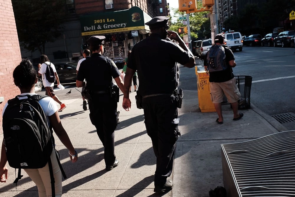 NEW YORK, NY - SEPTEMBER 16:  Police are viewed in an area which has witnessed an explosion in the use of K2 or 'Spice', a synthetic marijuana drug, in East Harlem on September 16, 2015 in New York City.  In a a news conference today with William Bratton, the police commissioner and Preet Bharara, the United States attorney for the Southern District of New York, it was announced that the Federal and New York City authorities have broken up a group that trafficked in synthetic marijuana. New York, along with other cities, is experiencing a deadly epidemic of synthetic marijuana usage which can cause extreme reactions in some users. According to New York's health department, more than 120 people visited an emergency room in the city in just one week in April.  (Photo by Spencer Platt/Getty Images)