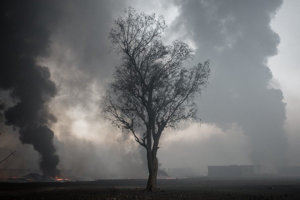 Burning oil pits in Qayyarah, Iraq on Oct. 26, 2016.