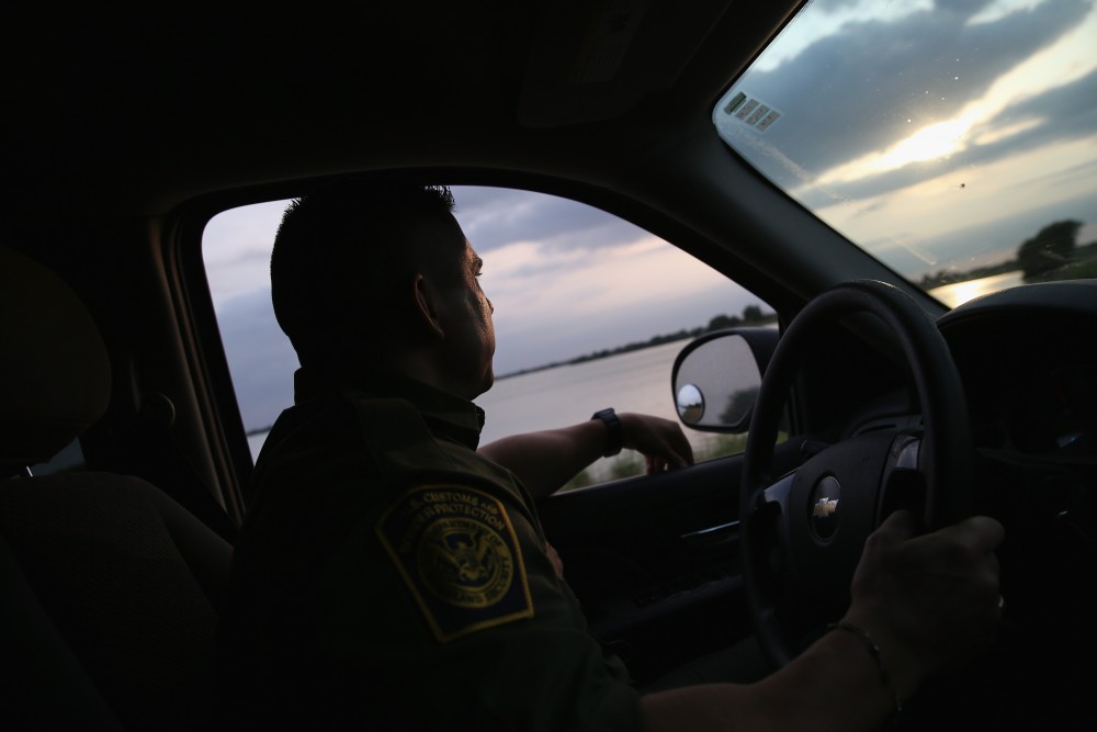 WESLACO, TX - APRIL 13:  A Border Patrol agent looks for illegal immigrants near the U.S.-Mexico border on April 13, 2016 in Weslaco, Texas. Border security and immigration, both legal and otherwise, continue to be contentious national issues in the 2016 Presidential campaign.  (Photo by John Moore/Getty Images)