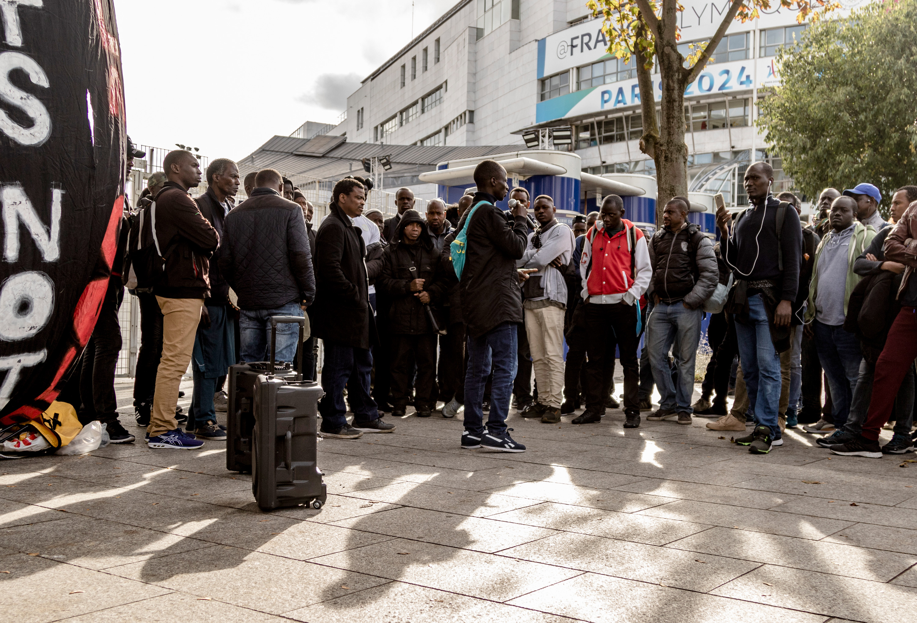 The rally of Gilet Noirs outside Charlety Stadium, Friday, Oct. 11, 2019. (Emma Francis/The Intercept)