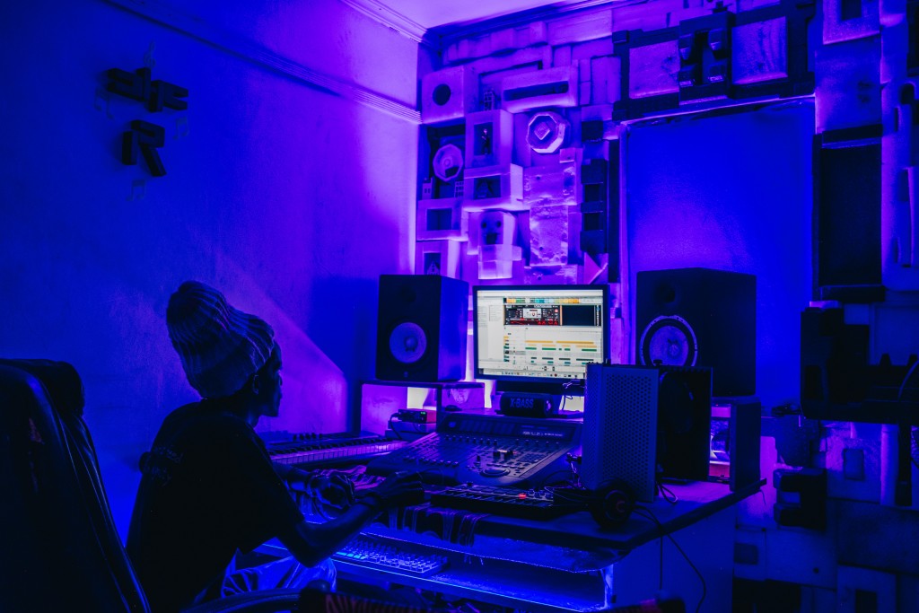 Ramsizo Burguda works on new music in the Dandora Hip Hop City studio. The youth-focused community-based organization which sits at the edge of the Dandora dump site serves as an an arts, technology and entrepreneurship space. Feb. 15, 2020. (Khadija Farah for The Intercept).